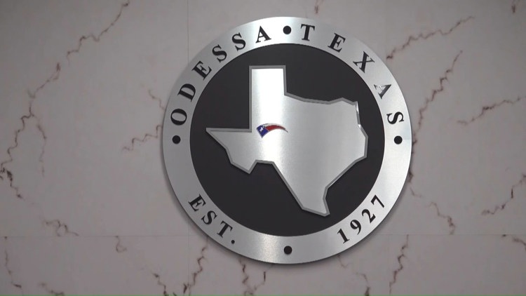 Odessa residents discussing city charter propositions over coffee